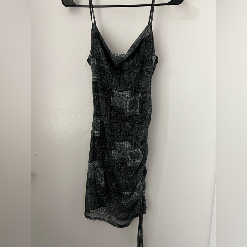 Two dresses! One mini one long. Both have glitter on them. Perfect for clubbing.